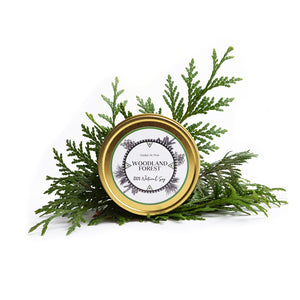 LODGE's 8oz travel tin candle in the scent Woodland Forest.
