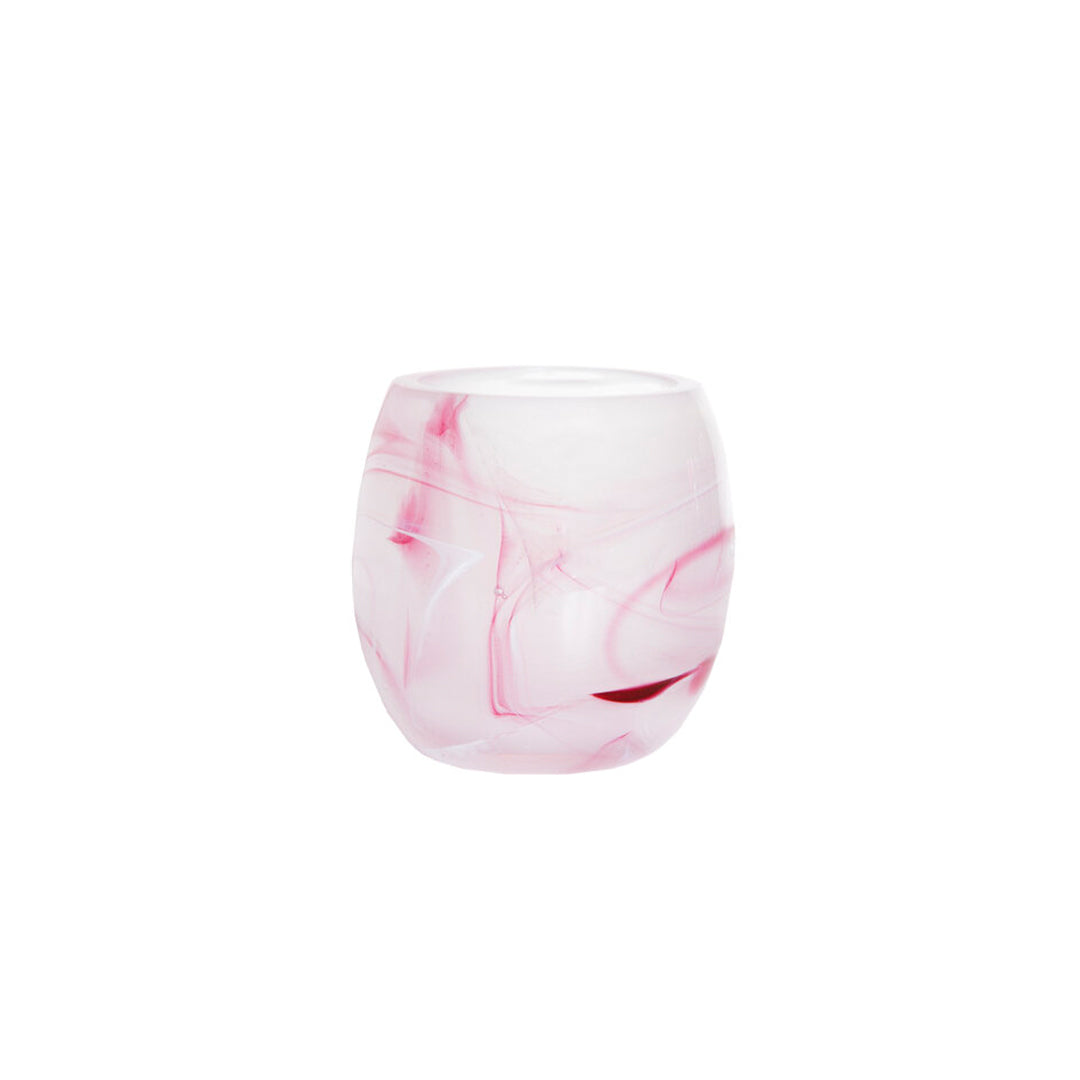 The Pink Hand-Blown Glass Votive, a collaboration between LODGE Soy Candles and glass artist Paull Rodrigue